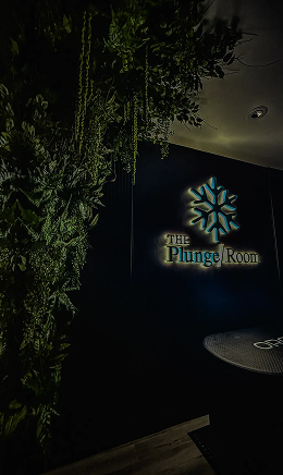 Illuminated Plunge Room mark with foliage at Englewood